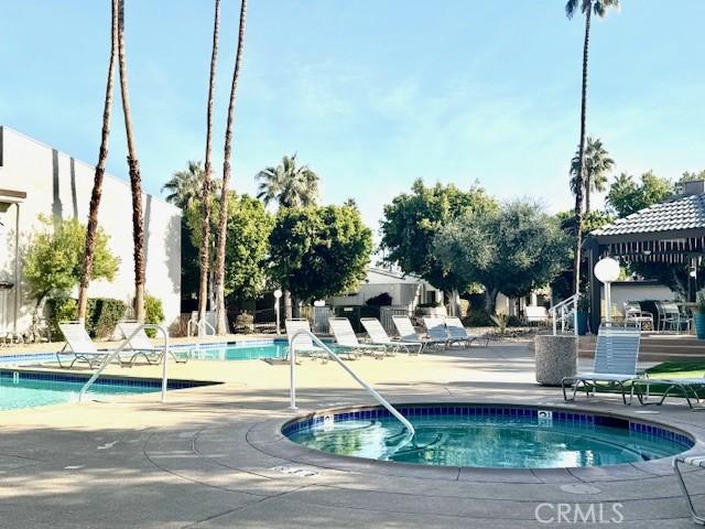 view of pool featuring a patio