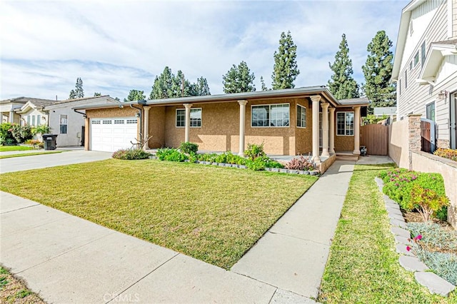 view of front facade with a front yard and a garage