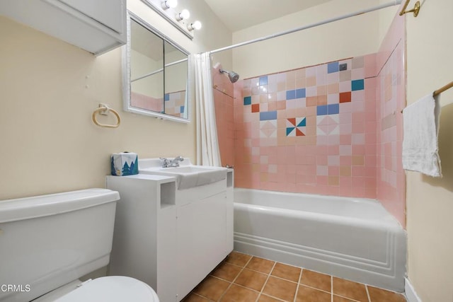 full bathroom featuring tile patterned flooring, vanity, shower / bath combination with curtain, and toilet