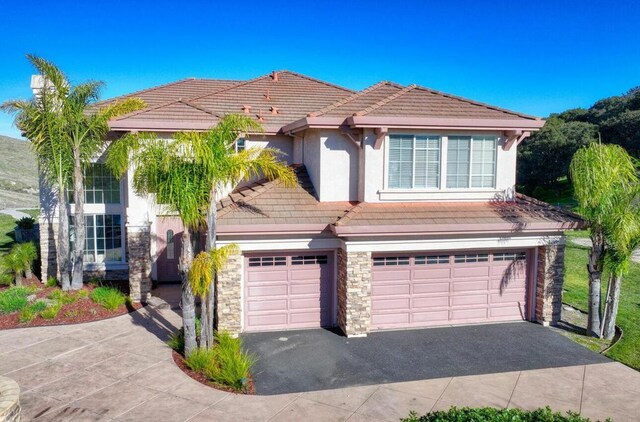 view of front of house with a garage