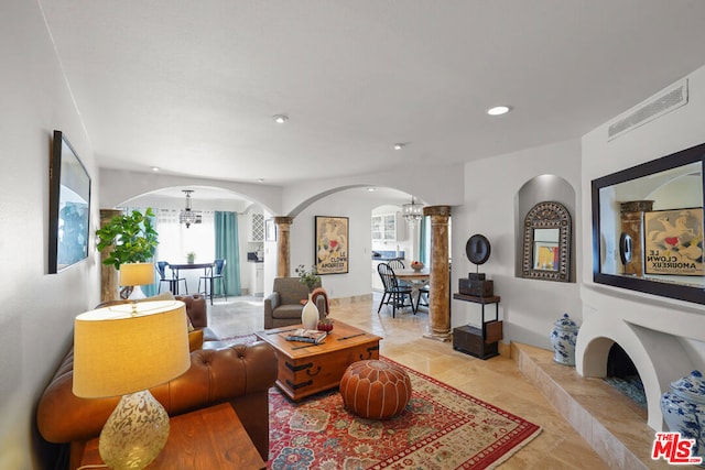 living room featuring an inviting chandelier