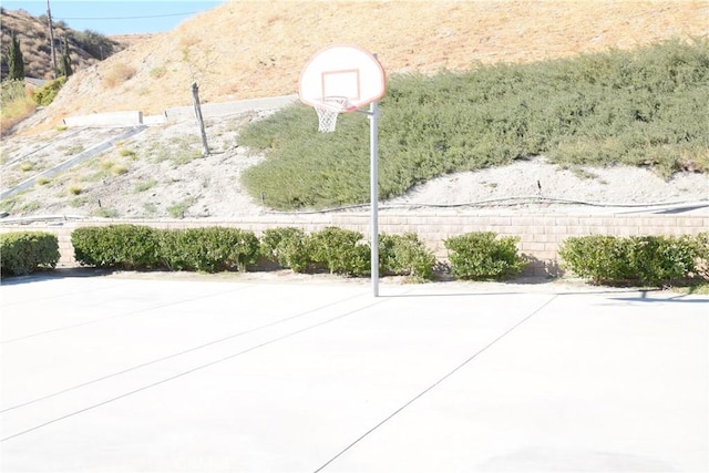 view of basketball court featuring a mountain view