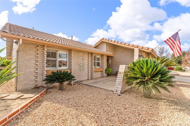 view of front of home featuring a patio area