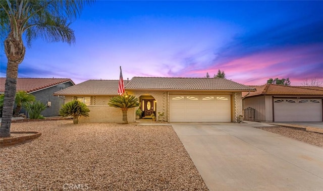 view of front of home with a garage