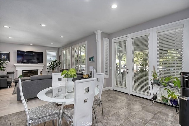 dining space with ornate columns