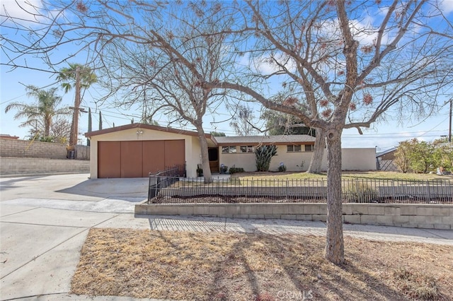 ranch-style house with a garage