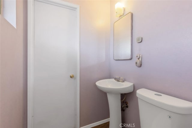 bathroom featuring toilet