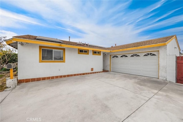 ranch-style house with a garage