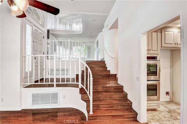 stairs with a towering ceiling