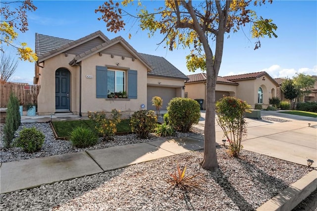 view of front of property with a garage