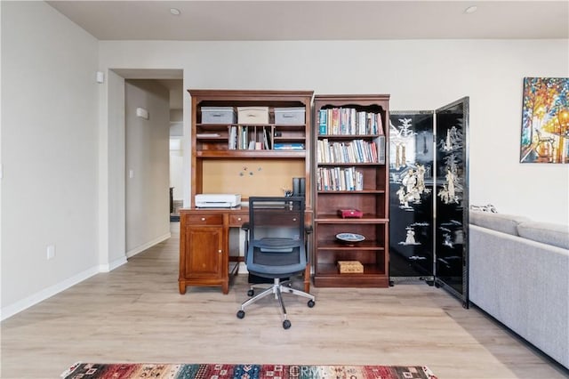 office area featuring light hardwood / wood-style flooring