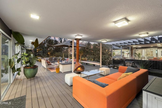 wooden deck with outdoor lounge area