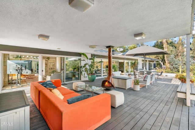 wooden deck featuring an outdoor hangout area