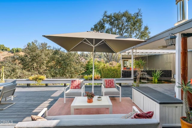 view of patio / terrace featuring a deck and an outdoor hangout area