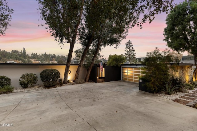 view of property exterior at dusk