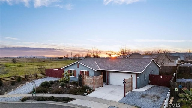 ranch-style home with a garage