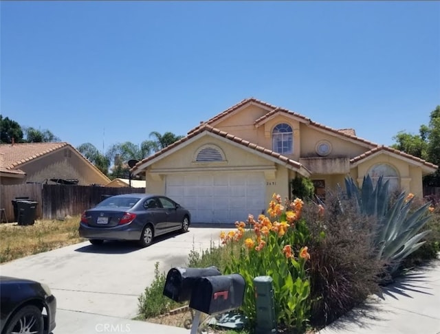 view of front of property featuring a garage