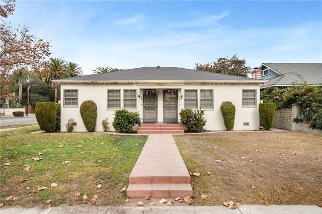 view of front of home with a front yard