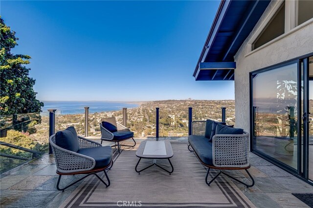 deck featuring a water view