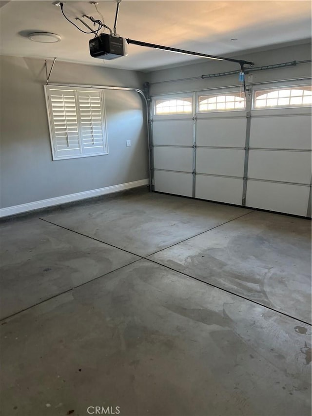 garage featuring a garage door opener