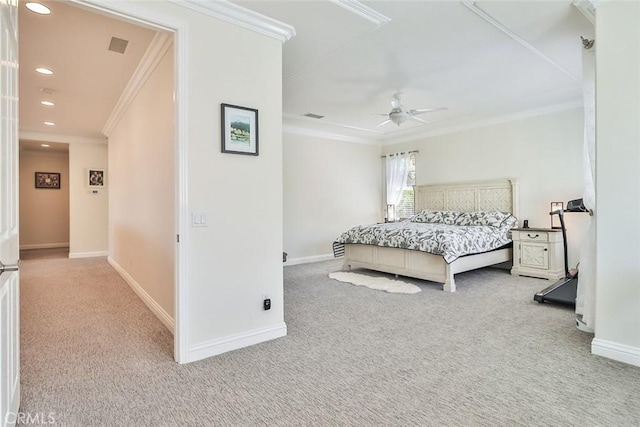 carpeted bedroom with ceiling fan and ornamental molding