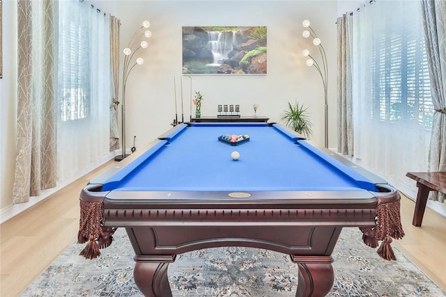 playroom with pool table and light hardwood / wood-style flooring