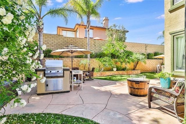 view of patio featuring grilling area