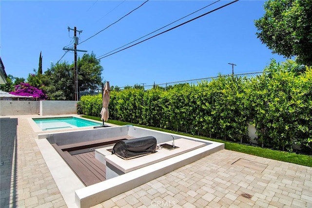 view of pool featuring a wooden deck