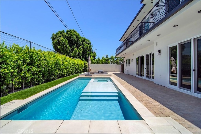 view of pool with a patio