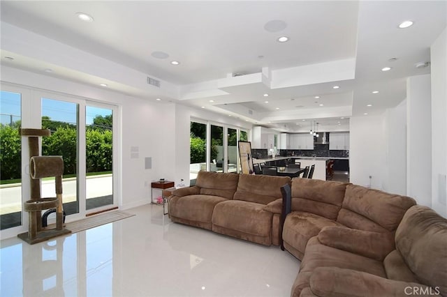 living room with light tile patterned floors