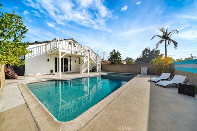 view of pool featuring a patio area