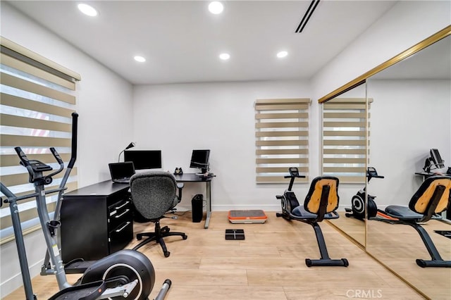 home office featuring hardwood / wood-style flooring