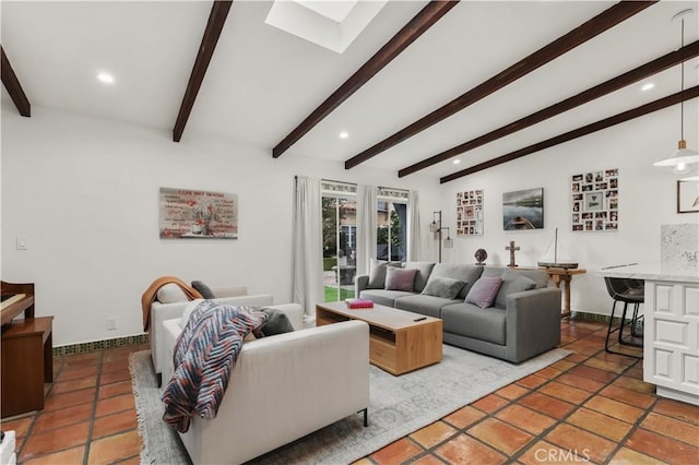 living room featuring tile patterned floors and lofted ceiling with beams