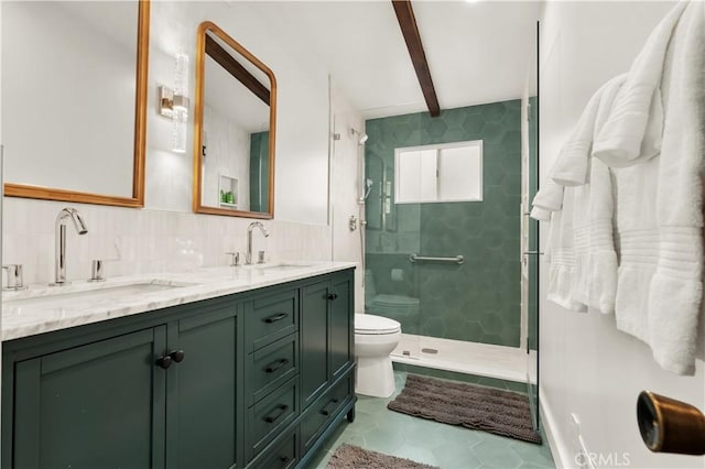 bathroom with toilet, a tile shower, tile walls, beam ceiling, and vanity