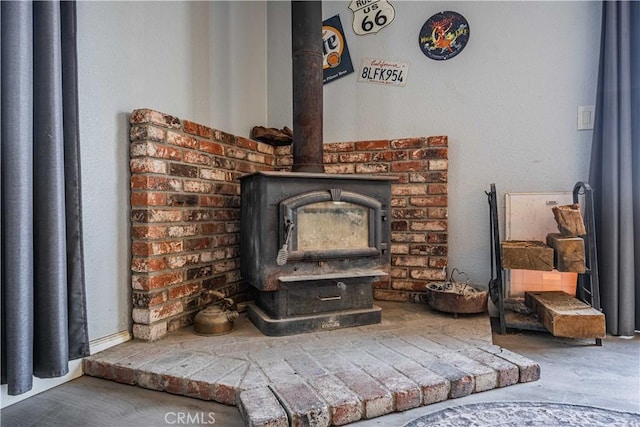 interior details featuring a wood stove