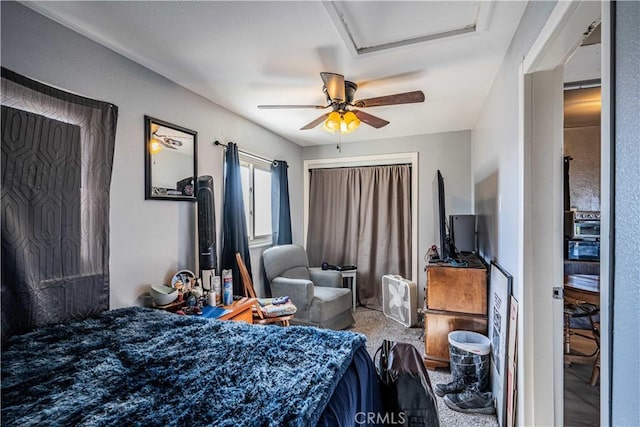 bedroom featuring ceiling fan and carpet floors