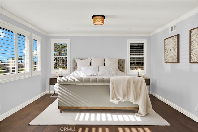 bedroom featuring dark hardwood / wood-style flooring and ornamental molding