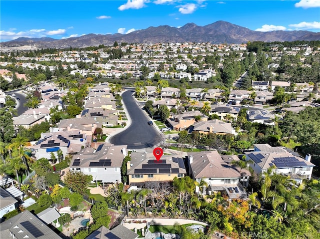 birds eye view of property featuring a residential view and a mountain view