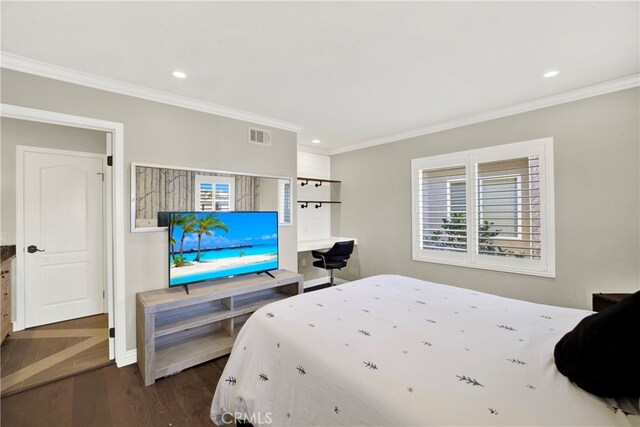 bedroom with recessed lighting, visible vents, dark wood finished floors, and ornamental molding