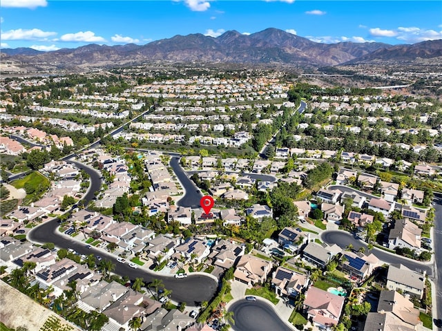 birds eye view of property featuring a residential view and a mountain view