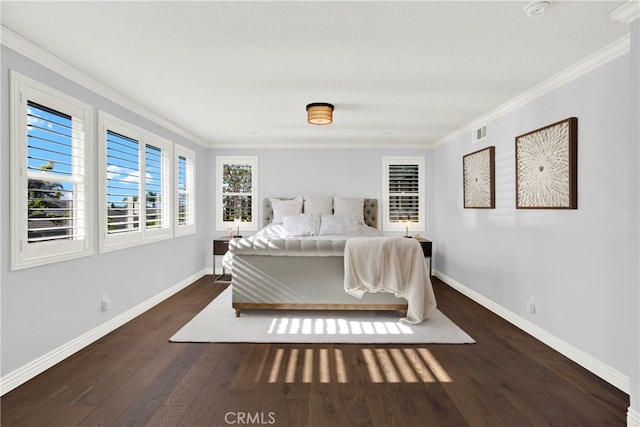 bedroom featuring dark hardwood / wood-style floors and ornamental molding