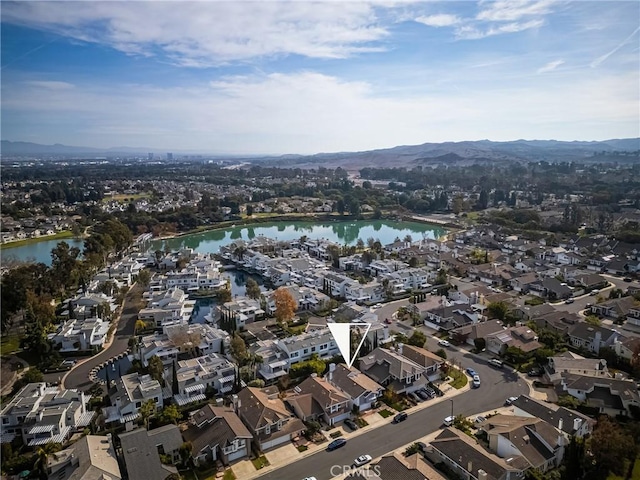 aerial view with a water and mountain view