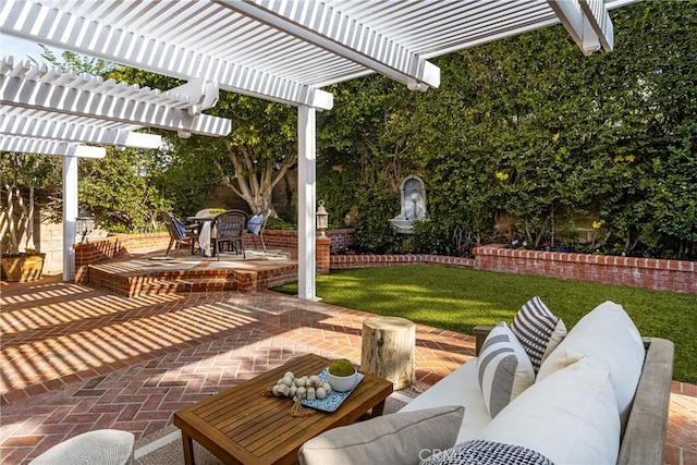 view of patio featuring an outdoor hangout area and a pergola