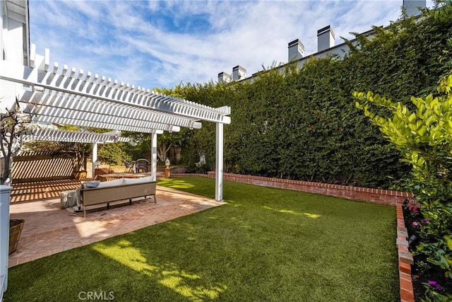 view of yard with a pergola, a patio area, and outdoor lounge area