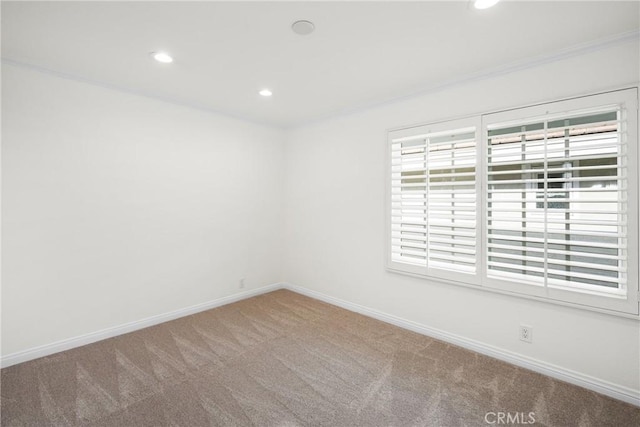 view of carpeted spare room