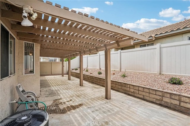 view of patio featuring cooling unit, a fenced backyard, and a pergola