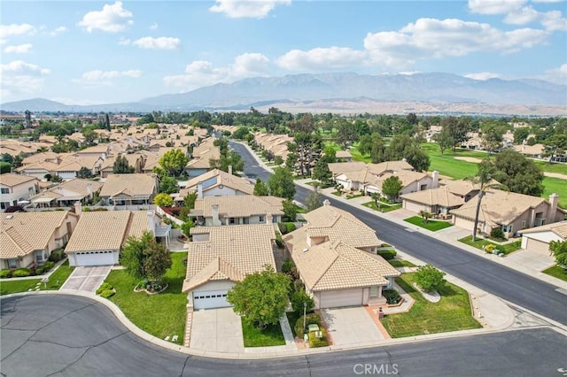 drone / aerial view with a mountain view and a residential view