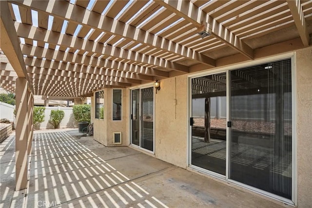 view of patio / terrace with fence and a pergola