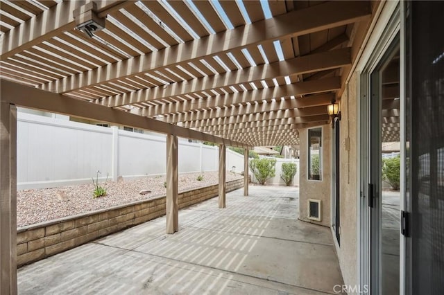 view of patio / terrace featuring a fenced backyard and a pergola