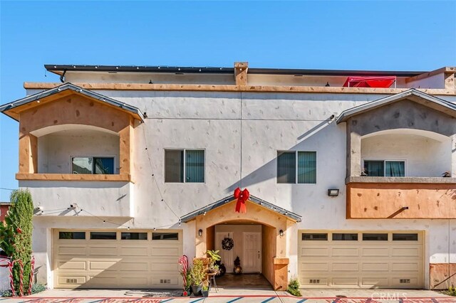 view of front of property featuring a garage